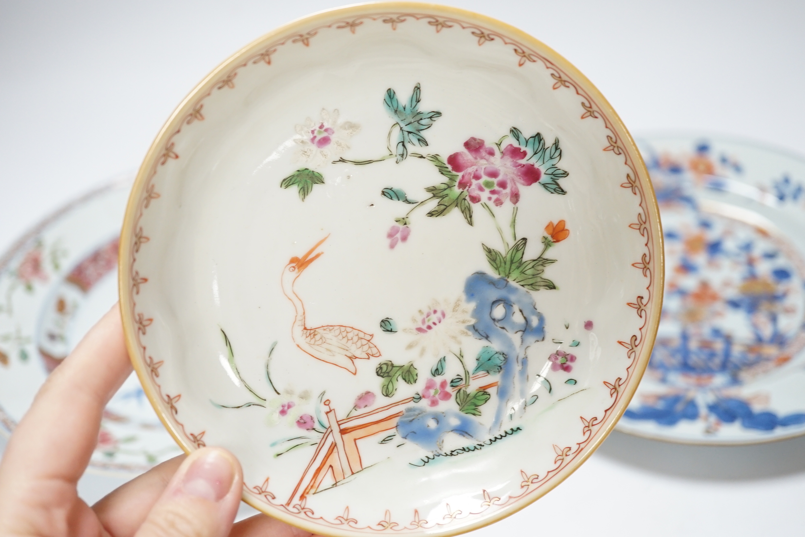 A collection of 18th century Chinese export plates and saucers
